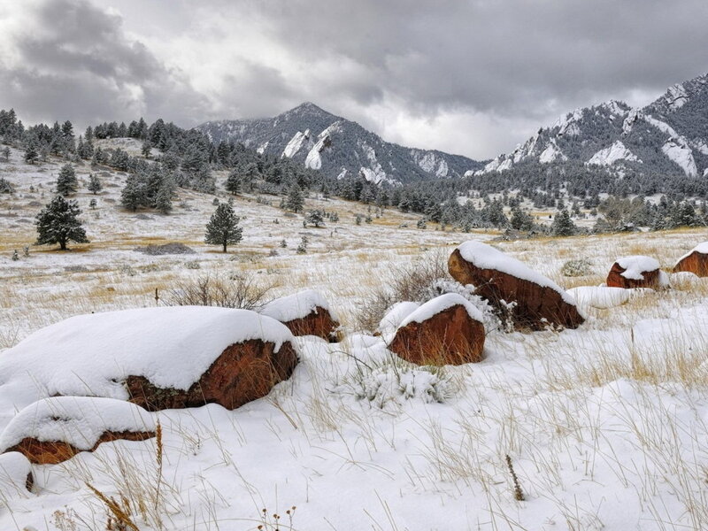 Snow-covered Rocks in Field