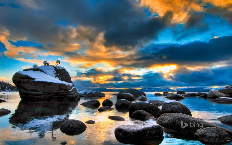 Snow-covered Rocks in Lake — Blue, Dramatic