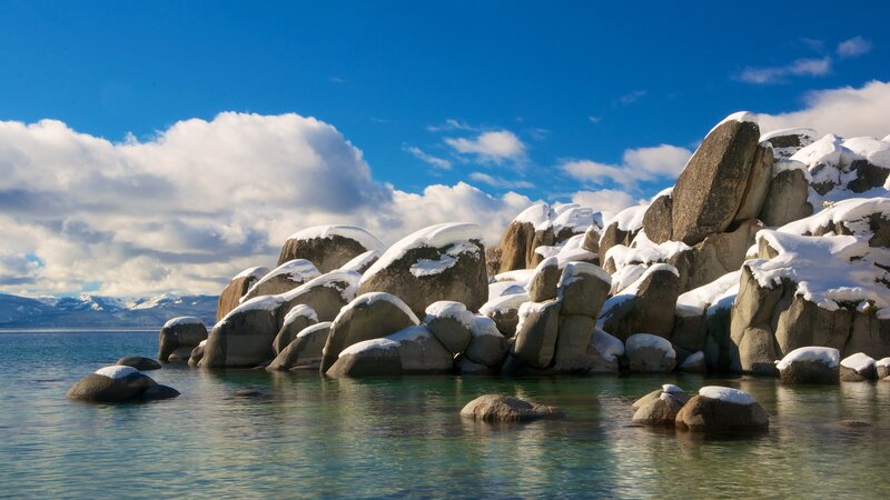 Snow-covered Rocks in Lake — Blue, Serene, Winter, Photograph