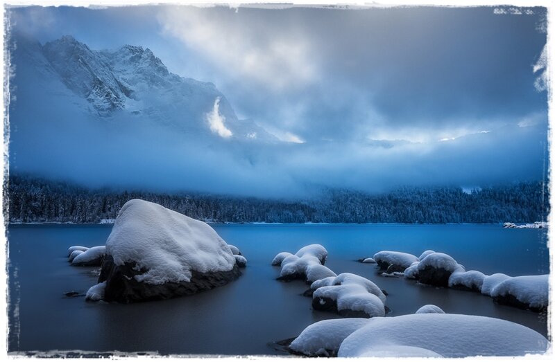 Snow-covered Rocks in Lake — Blue, Serene, Winter