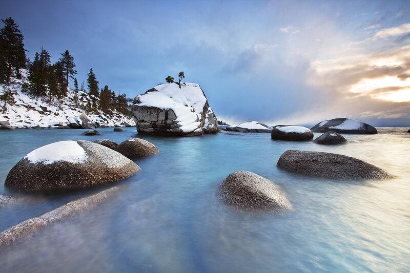 Snow-covered Rocks in Lake — Blue