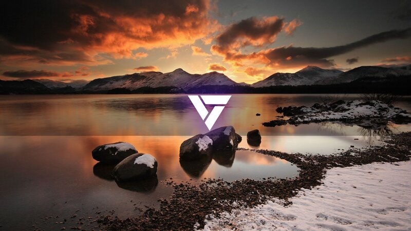 Snow-covered Rocks in Lake — Orange, Dramatic