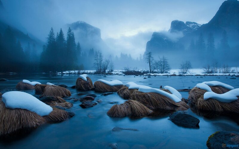 Snow-covered Rocks in River — Blue