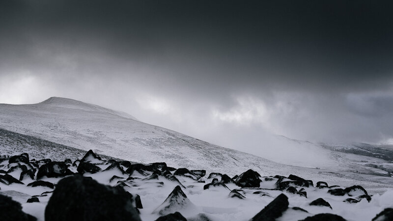 Snow-covered Rocky Hillside
