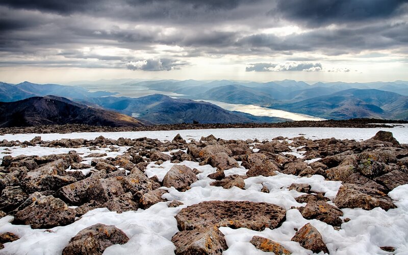 Snow-covered Rocky Terrain — Gray, Dramatic