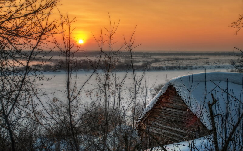 Snow-covered Roof at Sunset