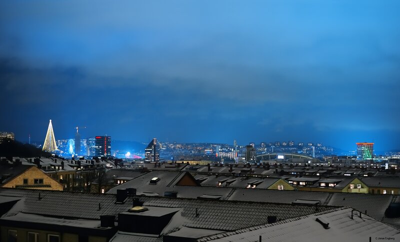 Snow-covered Rooftops at Night — Blue