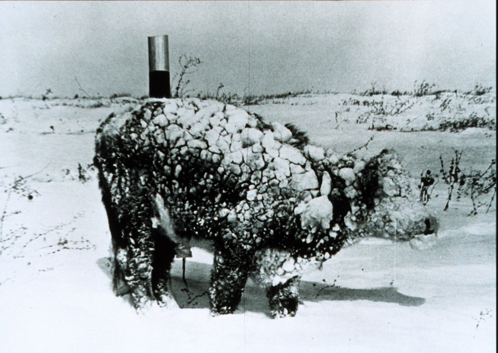 Snow-covered sculpture in winter
