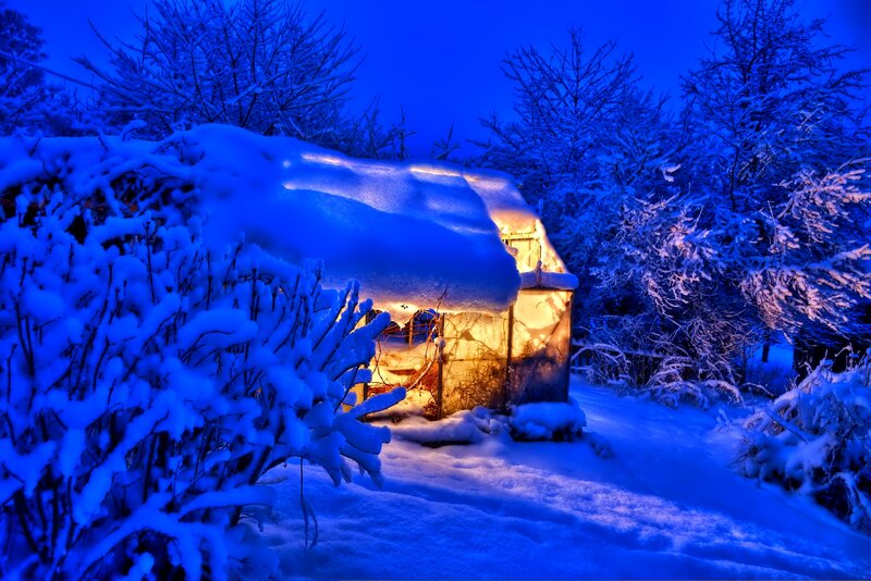 Snow-covered Shed at Night