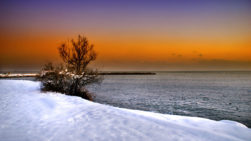 Snow-covered Shore at Sunset — Orange