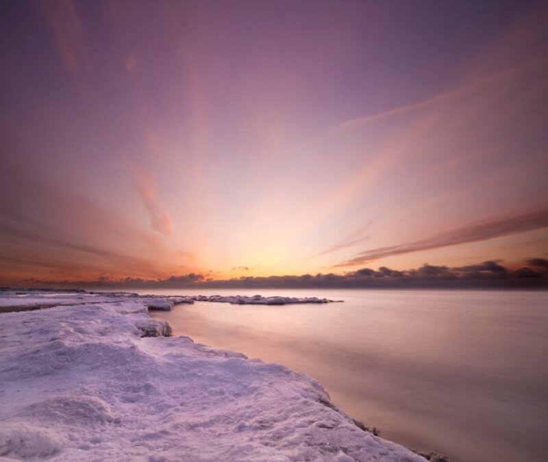 Snow-covered Shore at Sunset
