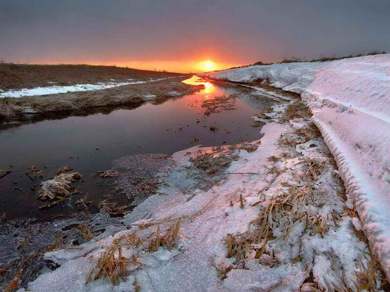 Snow-covered Stream at Sunset