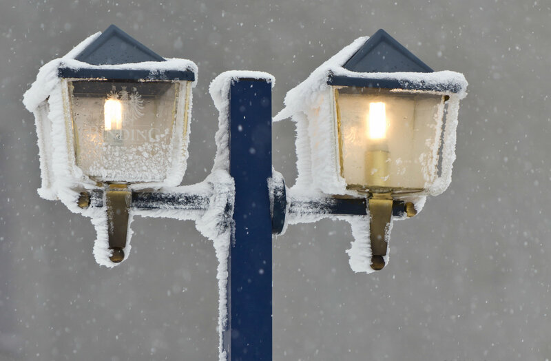 Snow-covered Street Lamps