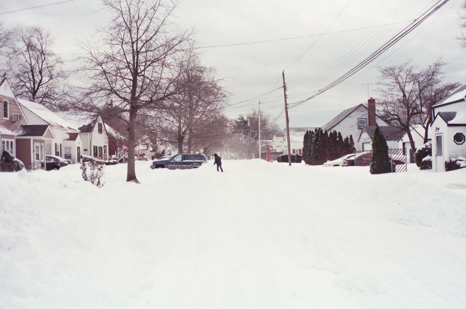 Snow-covered suburban street
