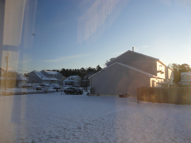 Snow-covered Suburban Yard