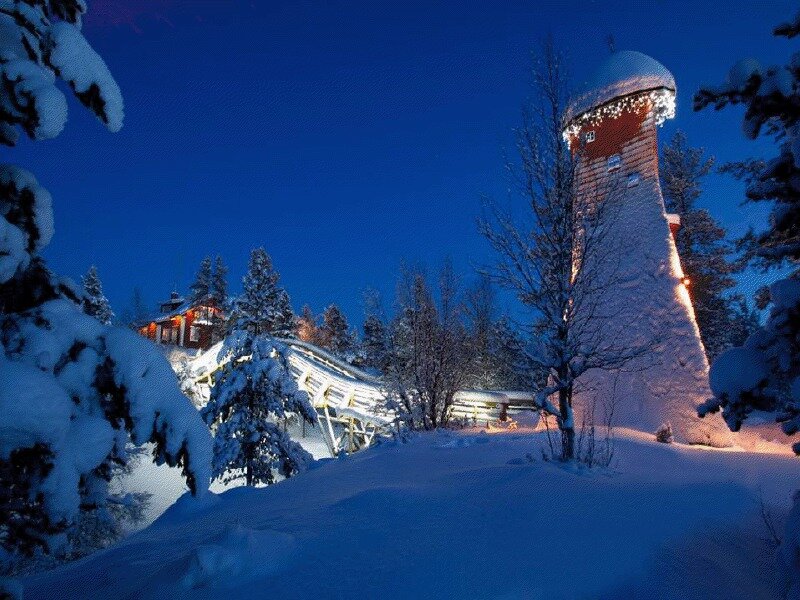 Snow-covered Tower at Night