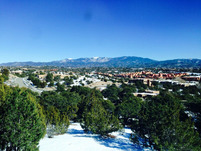 Snow-covered Town and Mountains