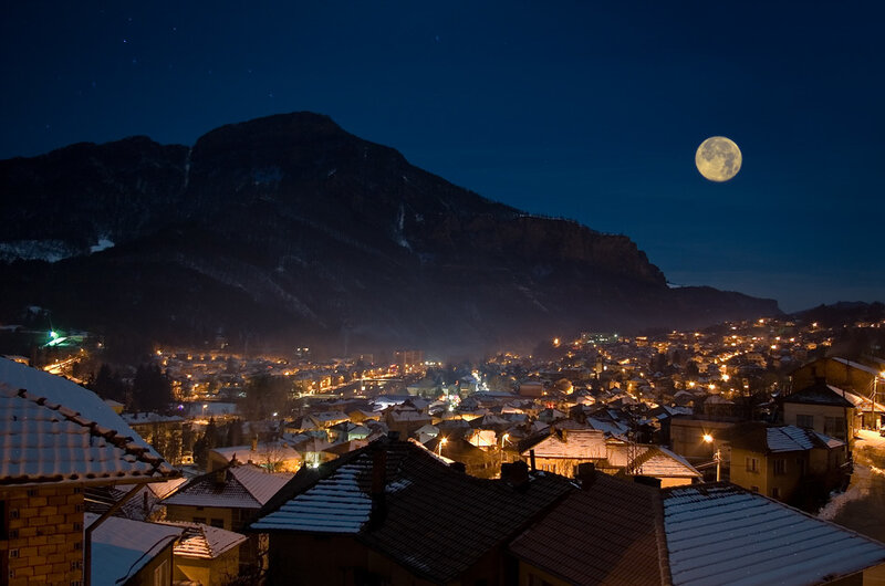 Snow-covered Town at Night