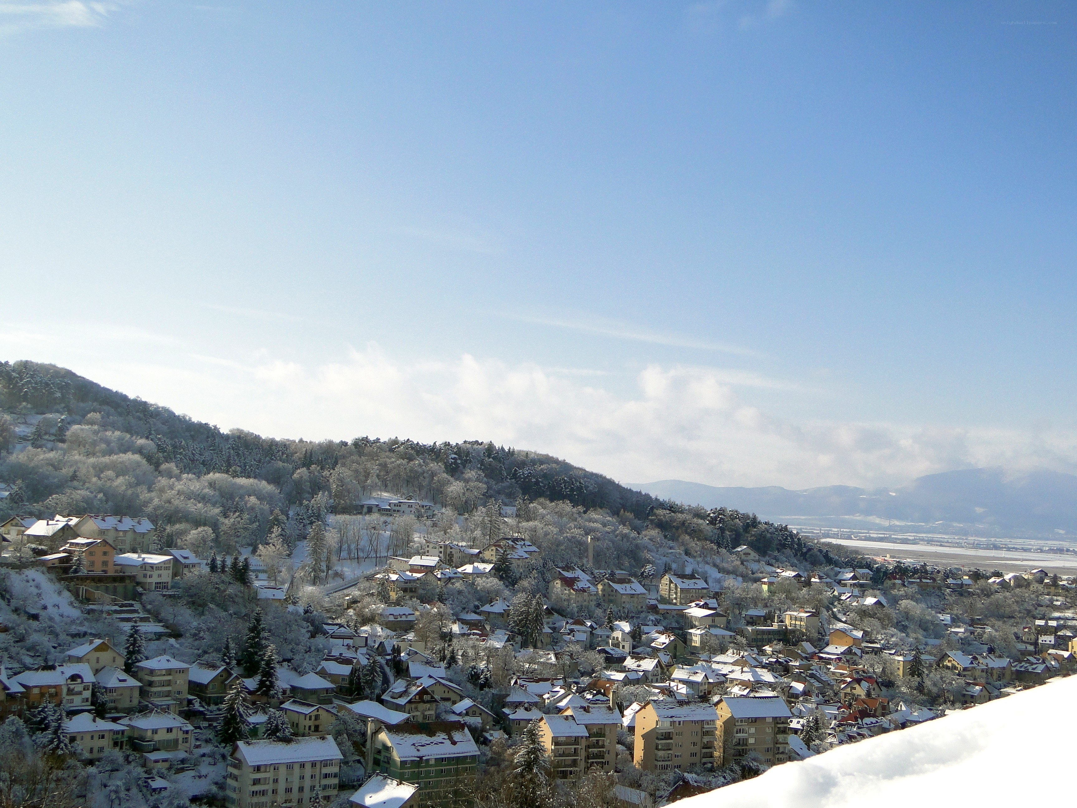 Snow-covered town on a hill