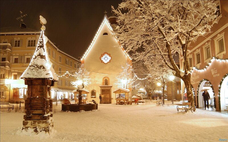 Snow-covered Town Square — White, Serene, Night