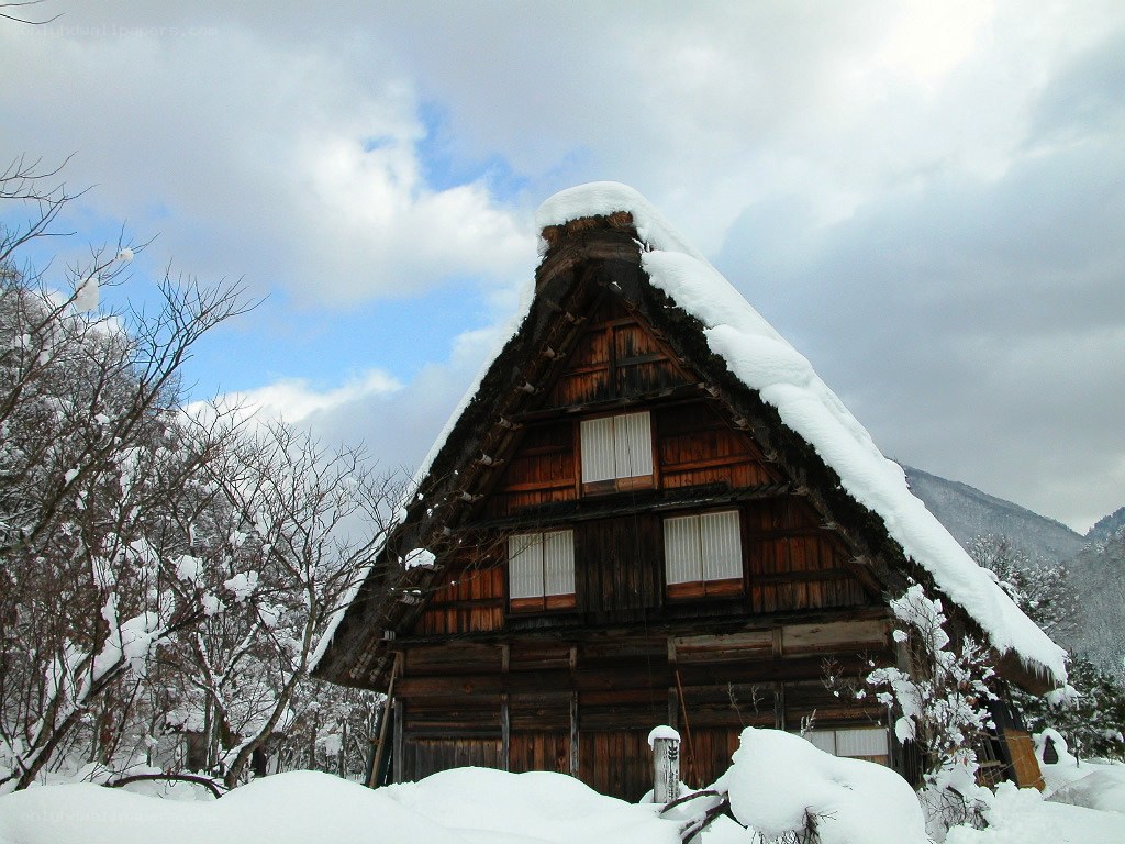 Snow-covered traditional house