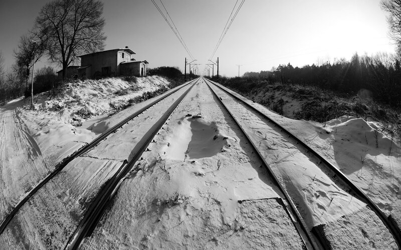 Snow-covered Train Tracks — Black, Desolate