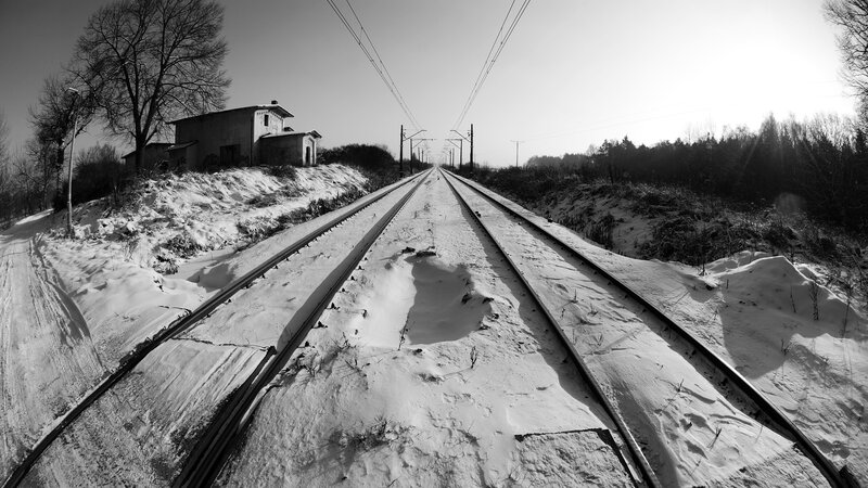 Snow-covered Train Tracks — Black, Desolate, Winter