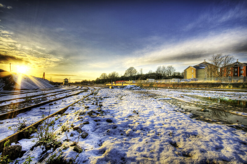 Snow-covered Train Tracks — Blue, Dramatic