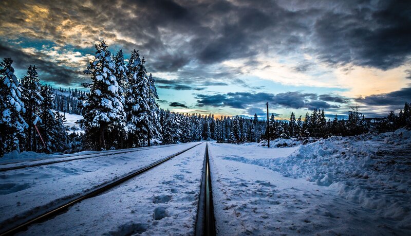 Snow-covered Train Tracks — Blue, Dramatic, Winter, Photograph