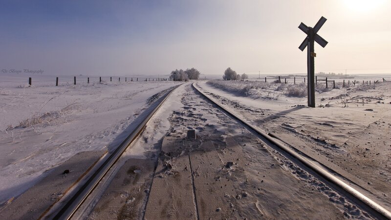 Snow-covered Train Tracks — White, Serene