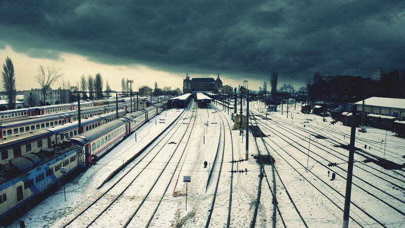 Snow-covered Train Yard — Gray