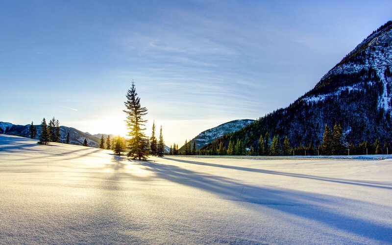Snow-covered Valley at Sunrise