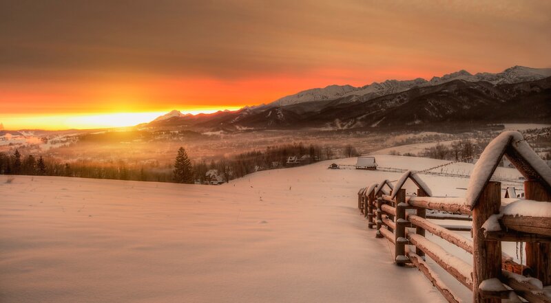 Snow-covered Valley at Sunset