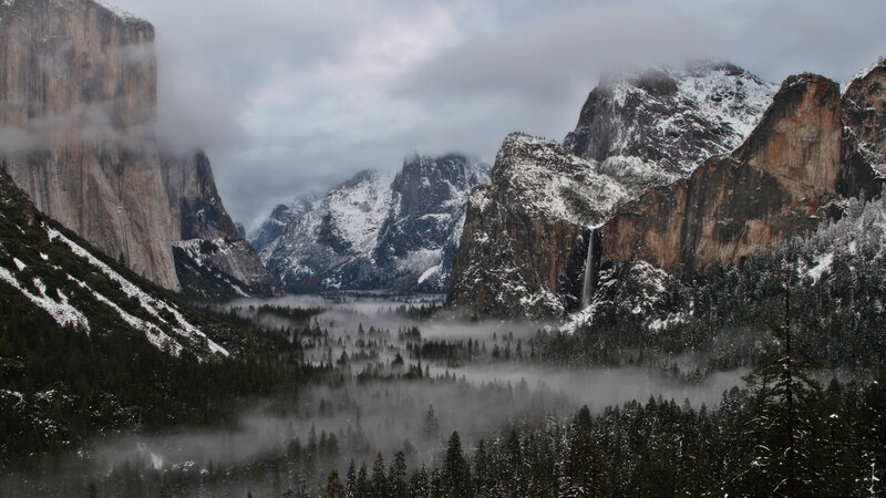Snow-covered Valley with Waterfall