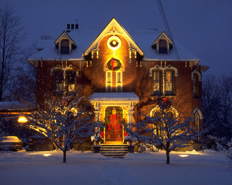 Snow-covered Victorian House