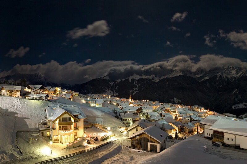 Snow-covered Village at Night — White, Serene, Photograph, Mountains