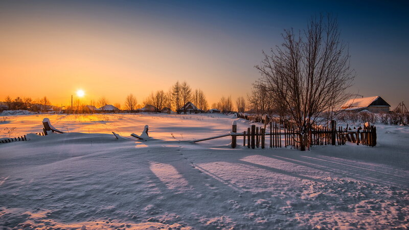 Snow-covered Village at Sunset — Orange, Serene