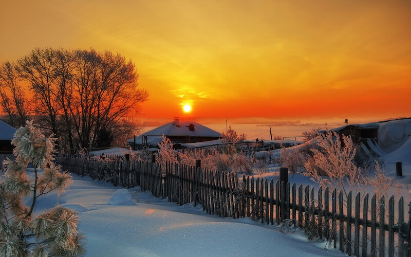 Snow-covered Village at Sunset — Orange