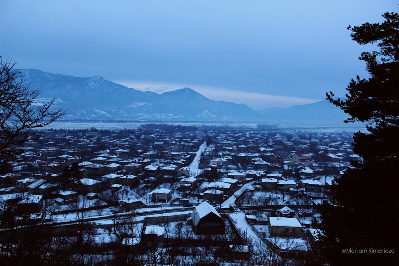 Snow-covered Village — Blue, Serene, Winter, Photograph, Mountains, Trees, Roofs