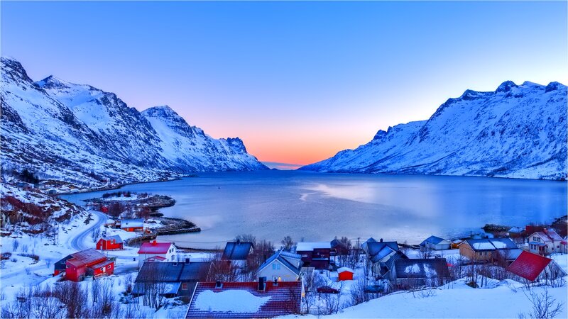 Snow-covered Village by Fjord — Blue