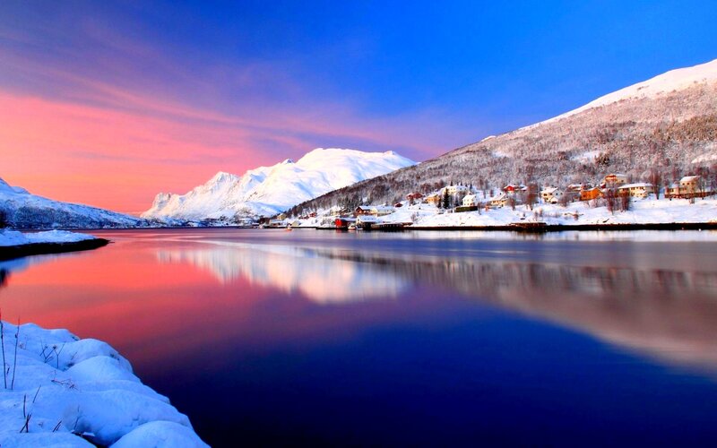 Snow-covered Village by Fjord