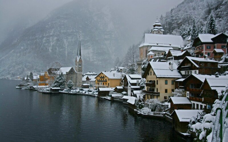 Snow-covered Village by Lake — White, Serene