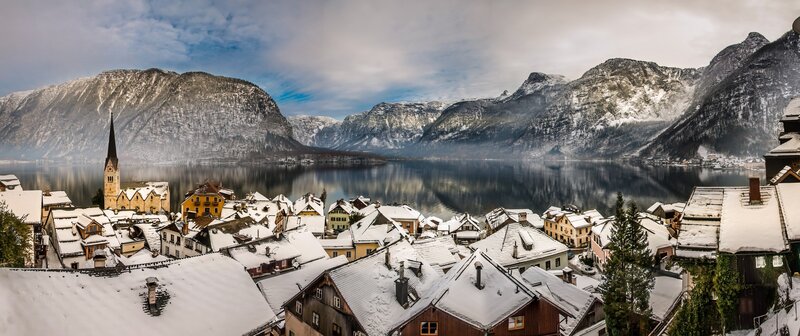 Snow-covered Village by Lake — White, Serene, Winter