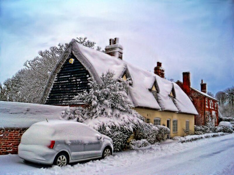 Snow-covered Village House