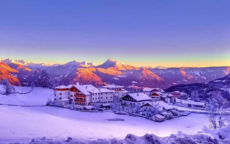 Snow-covered Village in Mountains — Purple