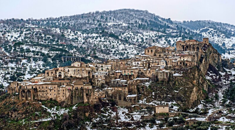Snow-covered Village on Hill