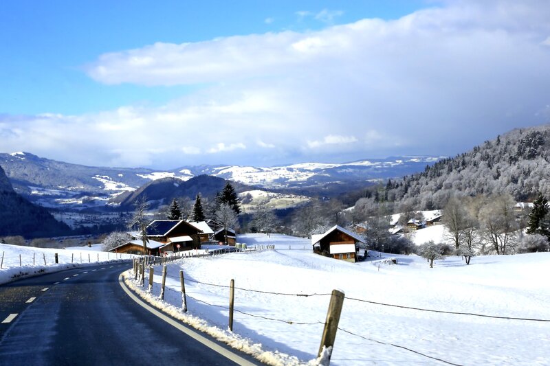 Snow-covered Village — White, Serene, Winter, Photograph, Mountains, Road
