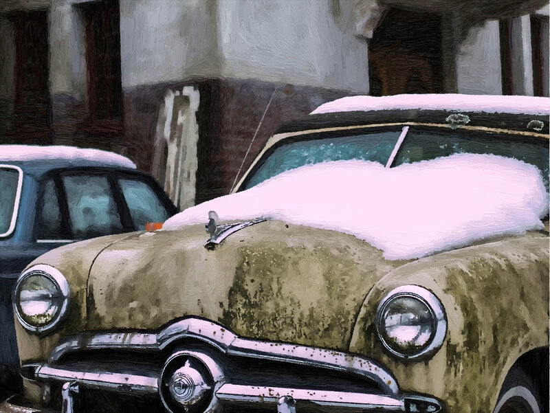 Snow-covered Vintage Car