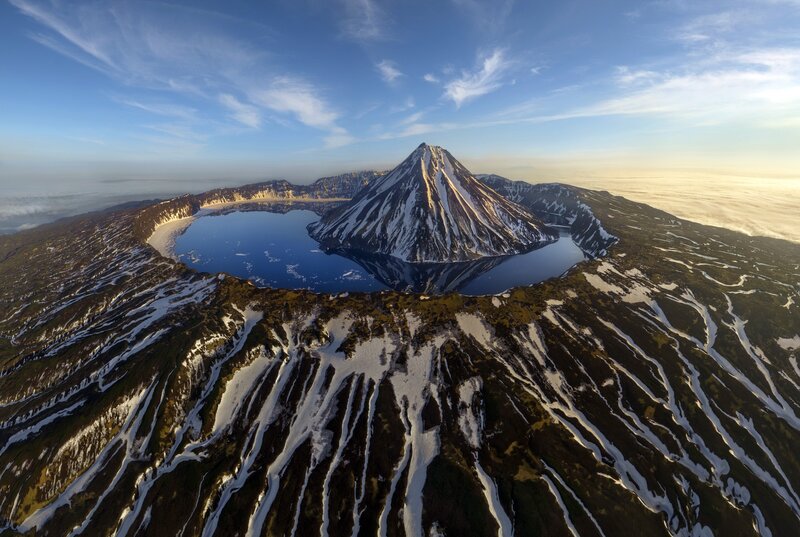 Snow-covered Volcano Lake