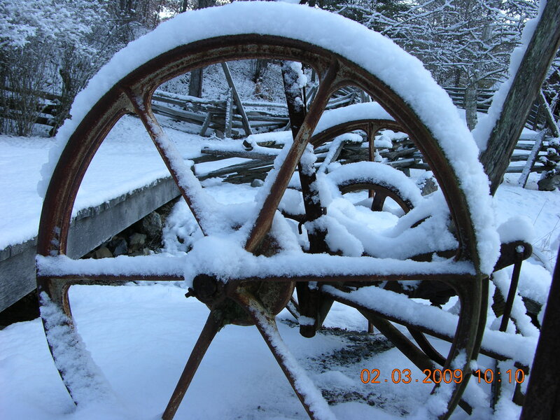 Snow-covered wagon wheels